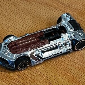 Shiny Silver and Black Toy Car